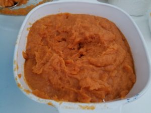 Image: bowl of baked and pureed sweet potatoes