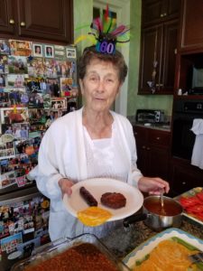 Image: eighty-year-old woman celebrating birthday