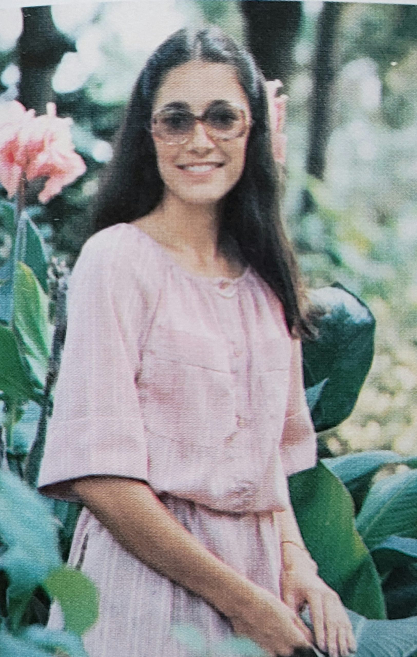Image: Teenaged girl from 70's with glasses.