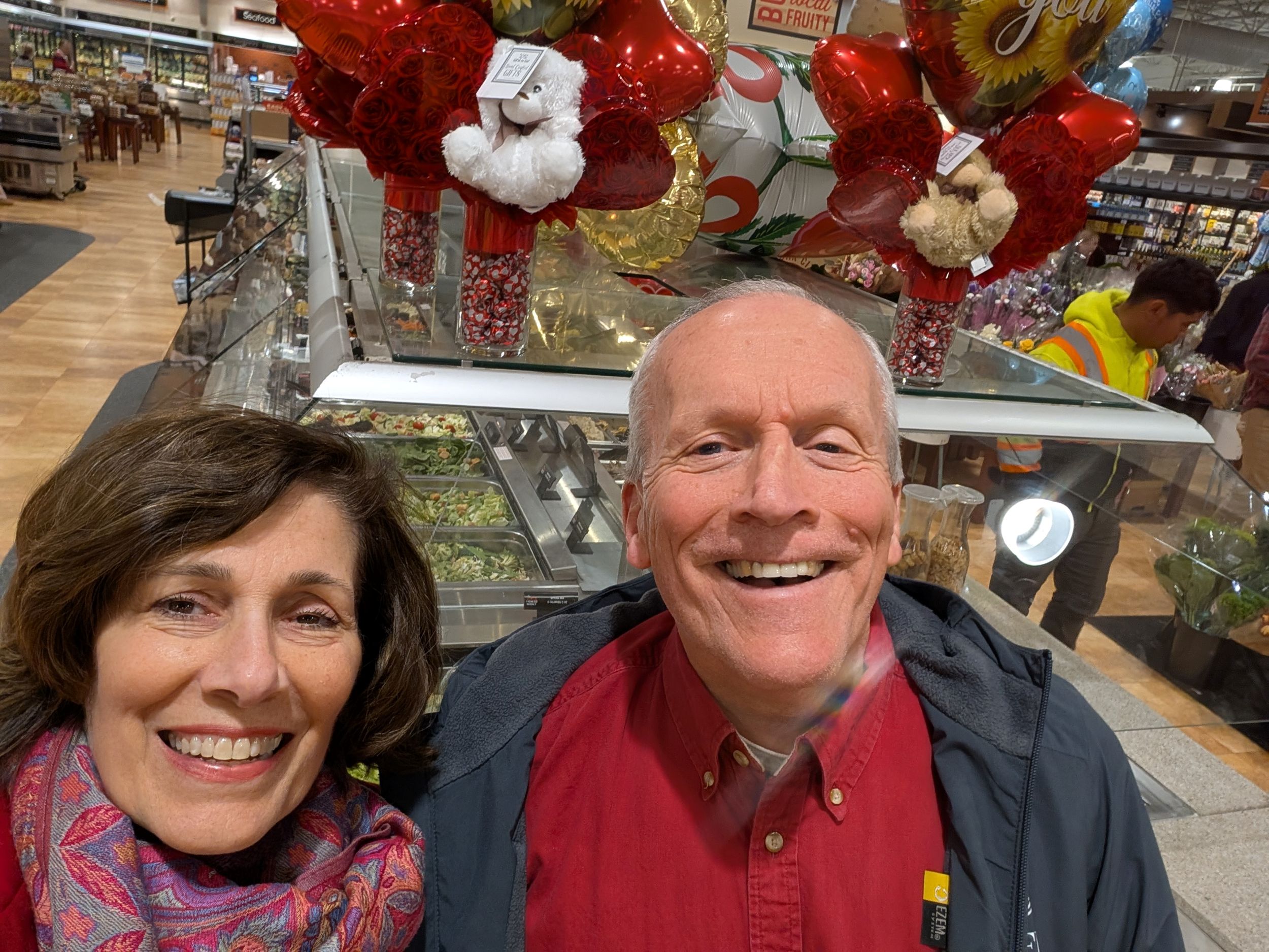Image: Couple at grocery store salad bar for Valentine's dinner
